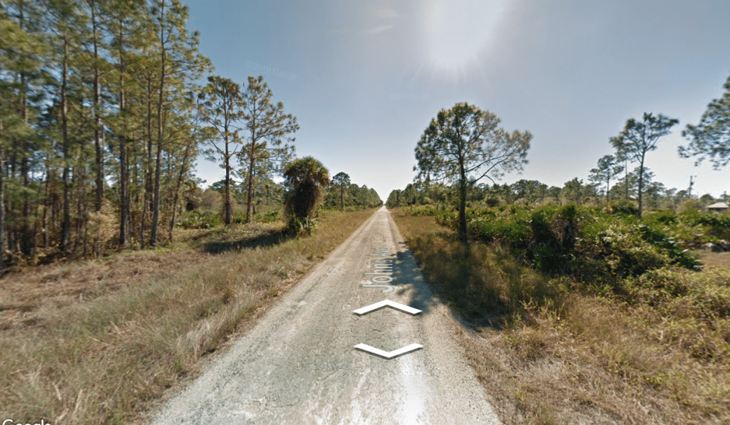 Half-acre flat terrain lot in Lehigh Acres, Florida with road access - photo 3