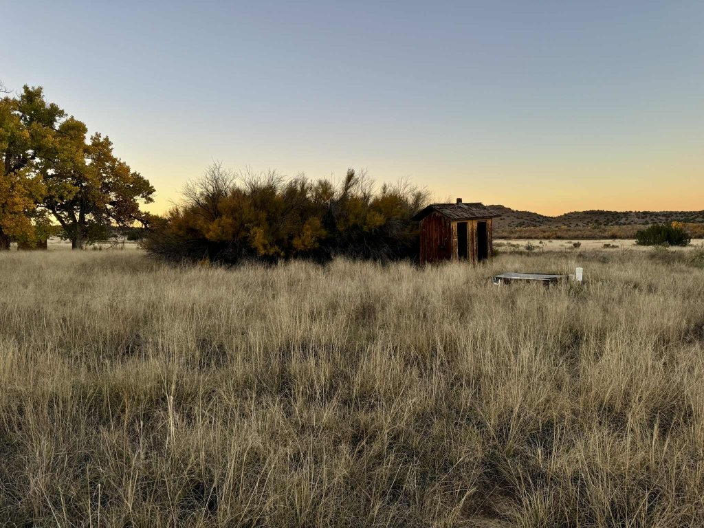 121-acre Santa Fe County, New Mexico land with flat terrain and wildlife presence