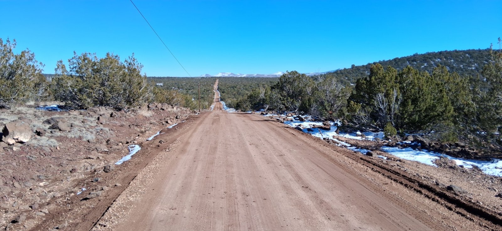 107-10-060 Navajo Dr facing east-Powerlines 1.15 Acres of Land for Sale by Show Low and Concho, Arizona perfect for off grid living and is a Stargazers Paradise