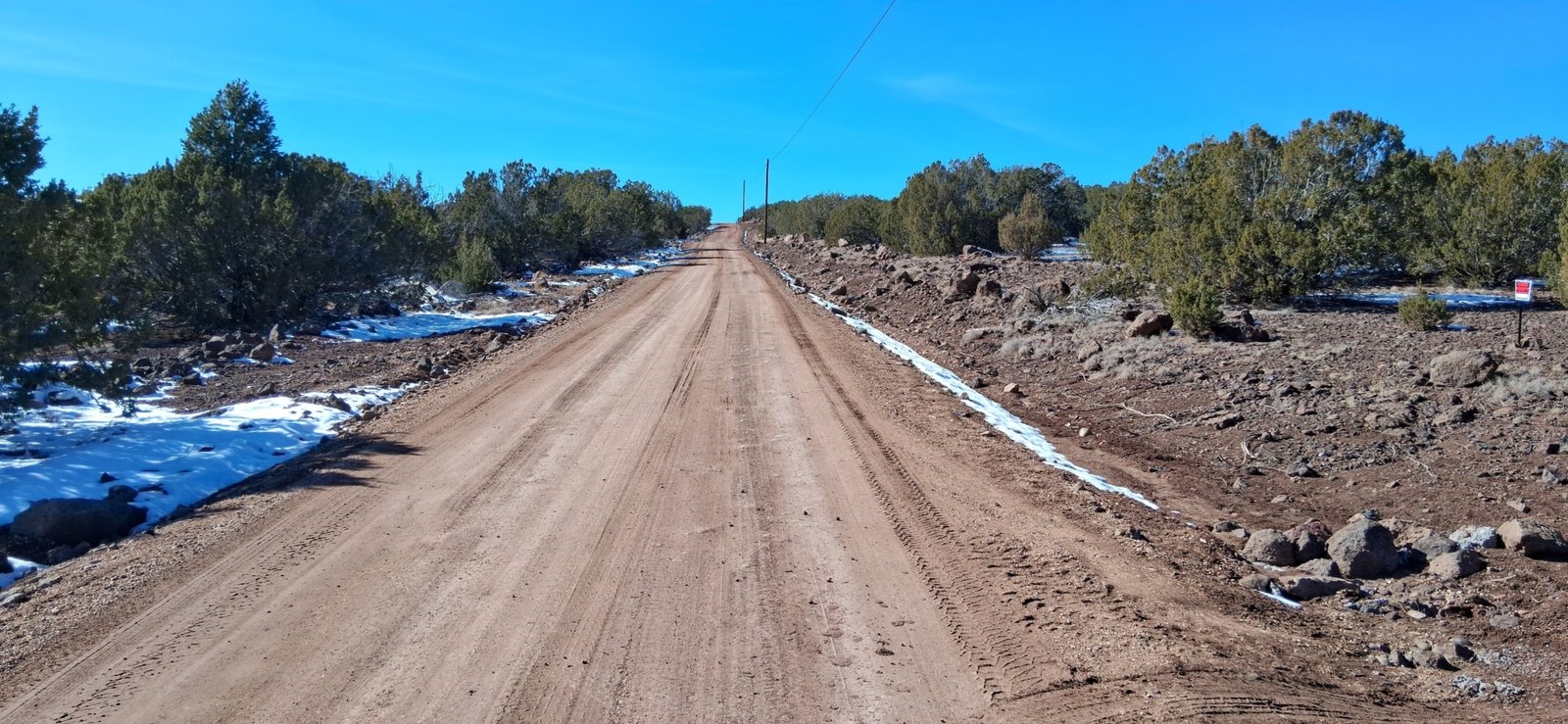 107-10-060 Navajo Dr facing west-Powerlines
