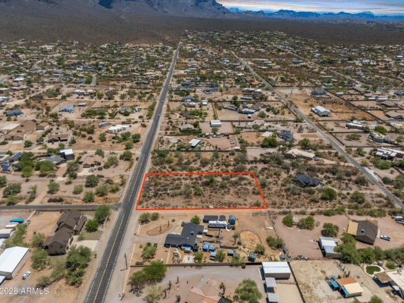 1.06 Acres of Land For Sale in Apache Junction, Arizona With Paved Road Access, Mountain Views, And Water Nearby.