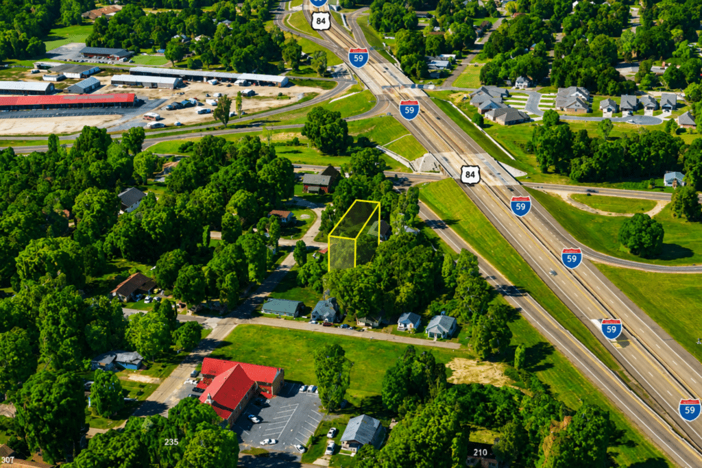0.10-acre home site near Laurel, MS: level terrain, paved road, community sewer - photo 6
