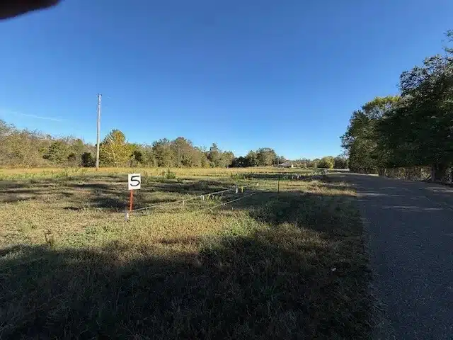21.98 Acres with Ponds & Building — Overton Loop — $1,000 Down